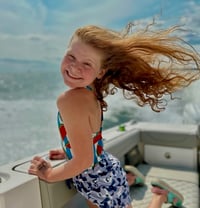 Reece enjoys time on the family's Pursuit OS 355 Offshore
