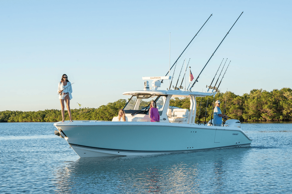 A family fishes on the Pursuit S 328