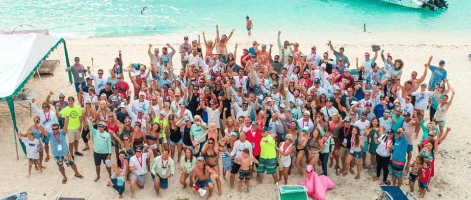 People gather on the beach for the Crossing