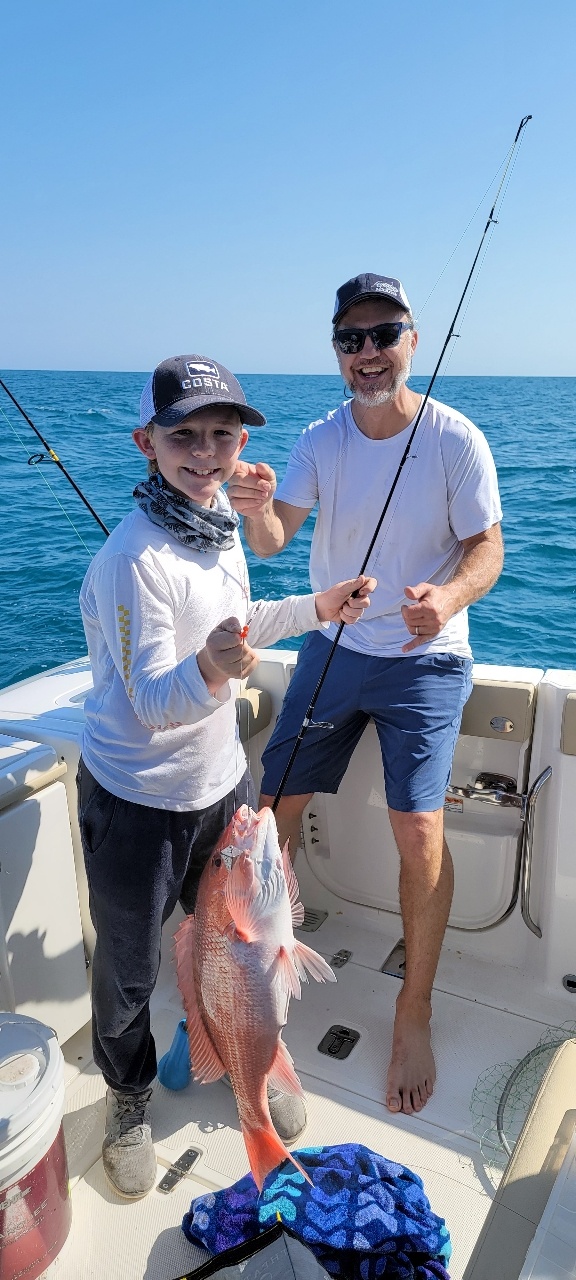 Elijah and Brian fishing 