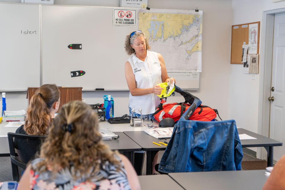 Students take a boating safety course in  a classroom at Chapman School of Seamanship. 