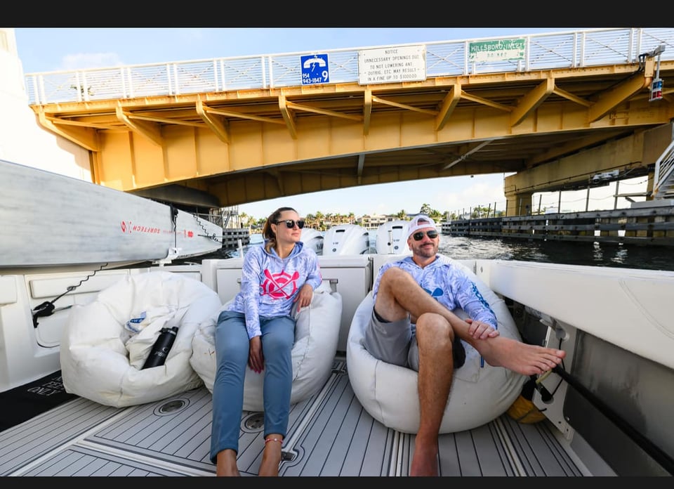 Liubov and Danny on a Pursuit S 378 Center Console