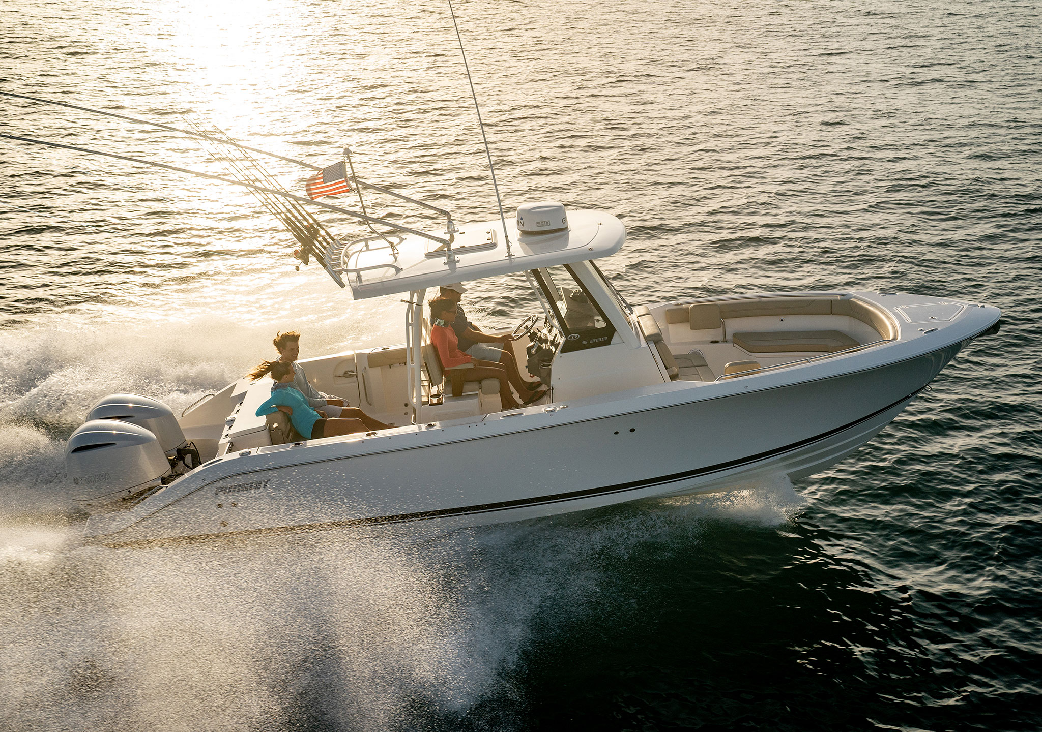 Aerial profile view of the S 288 Sport boat running right.