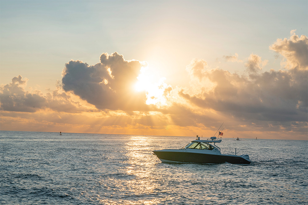 Sunrise view of DC 326 dual console boat.