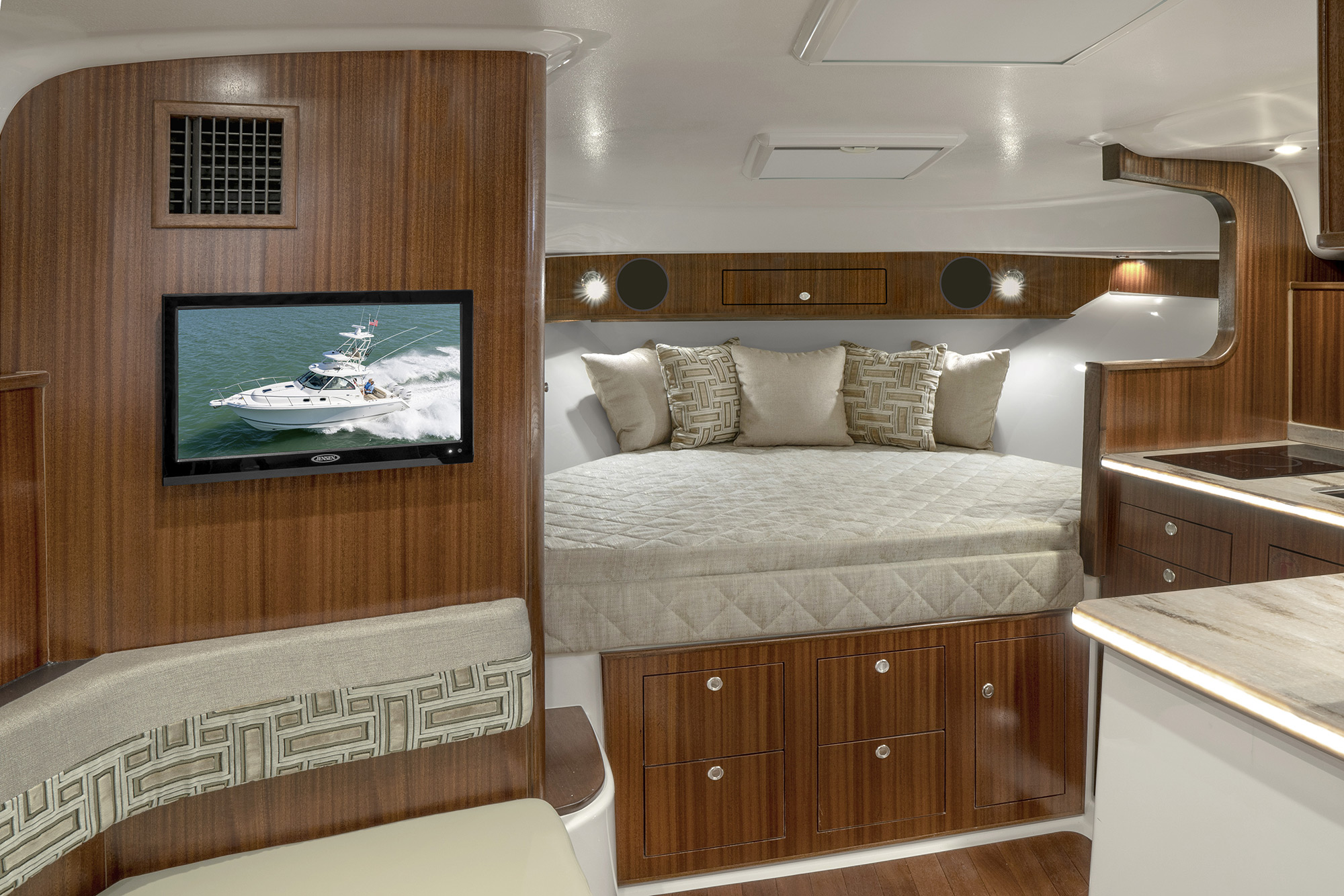 OS 385 Offshore boat cabin with berth for overnighting.