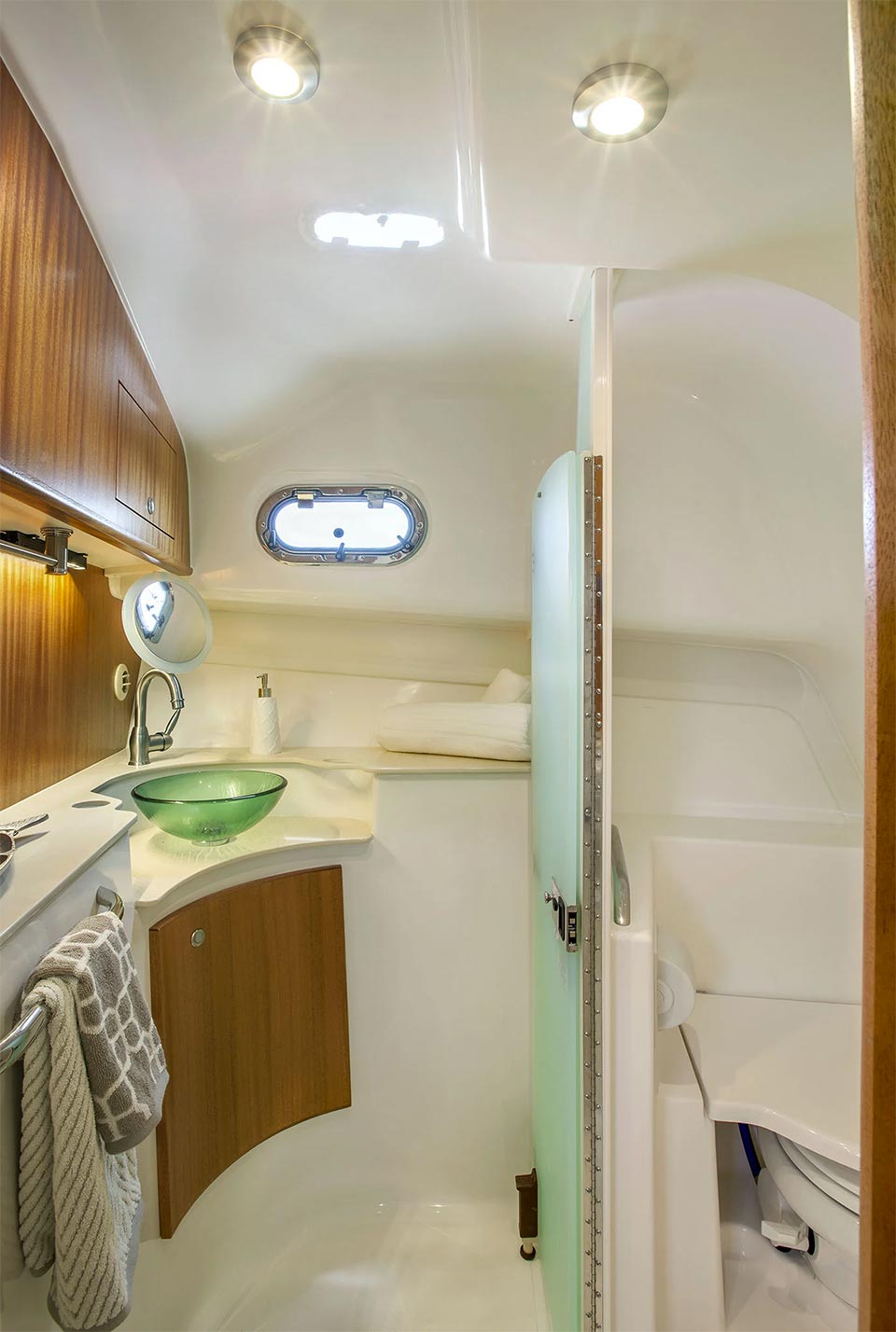 Charge into the day feeling fresh with a hot shower in the best offshore boat for sale.